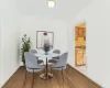 Dining space with sink and light hardwood / wood-style flooring