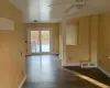 Unfurnished room with wood-type flooring and ceiling fan