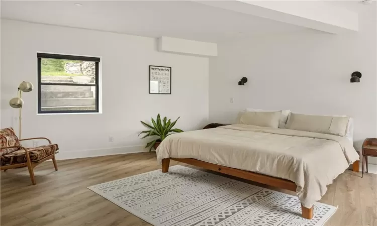 Bedroom with light wood-type flooring