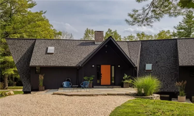 View of front of property featuring a patio