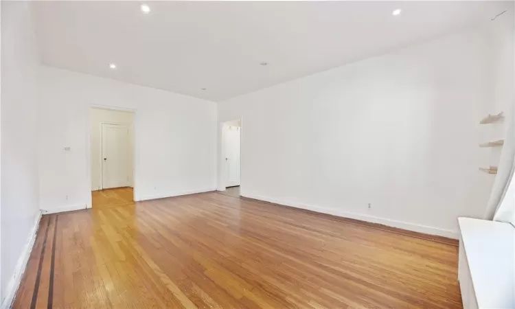 Empty room featuring light hardwood / wood-style flooring