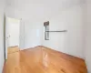 Unfurnished bedroom with light hardwood / wood-style flooring