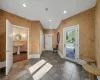 Entryway featuring dark tile patterned flooring