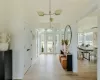 Ranch-style house featuring a garage, covered porch, and a carport