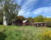 View of yard featuring an outbuilding