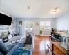 Living room featuring a healthy amount of sunlight and light wood-type flooring