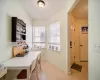 Dining area with light tile patterned floors