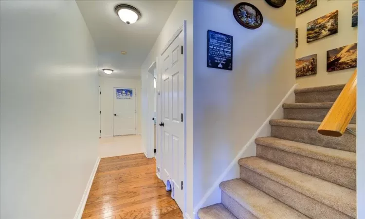 Hall featuring wood-type flooring