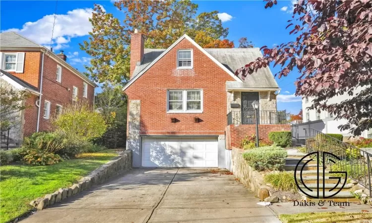 View of front of home featuring a garage