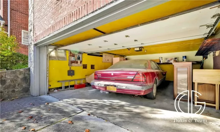 Garage featuring a garage door opener