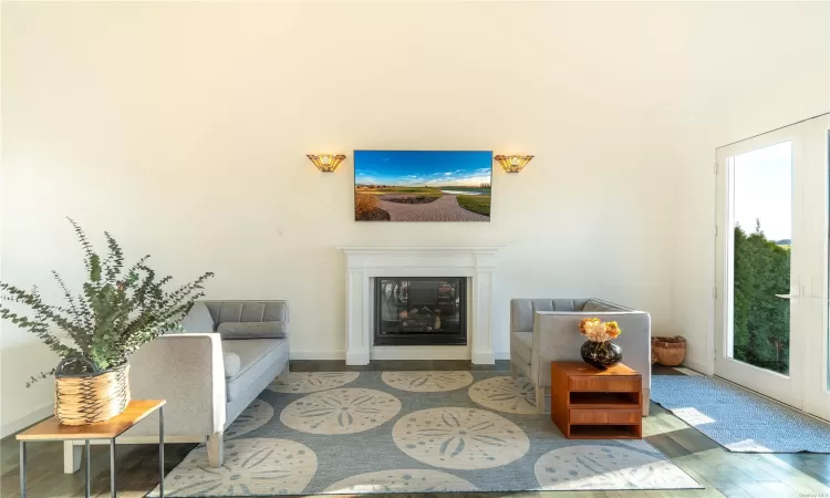 Living room featuring hardwood / wood-style floors and french doors