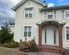 Property entrance featuring a balcony