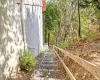 Stairs Leading Down to Back of the House Towards the Trails