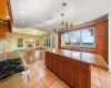 Large Kitchen with Center Island, Bright Light and Open to Living Room