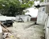 View of patio with an outbuilding