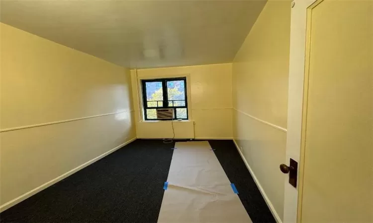 Unfurnished room featuring carpet