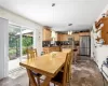 Spacious Dining Area with glass sliding doors to deck