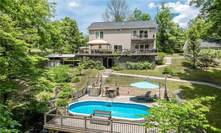 View of back of home from pool