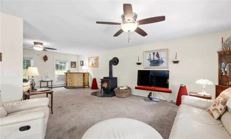 Living room featuring a wood stove