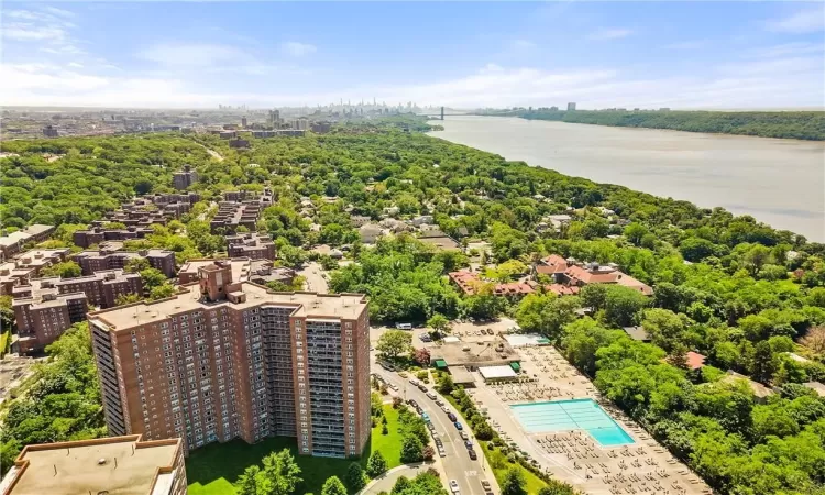 Birds eye view of property featuring a water view