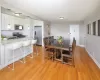 Dining room with light hardwood / wood-style floors