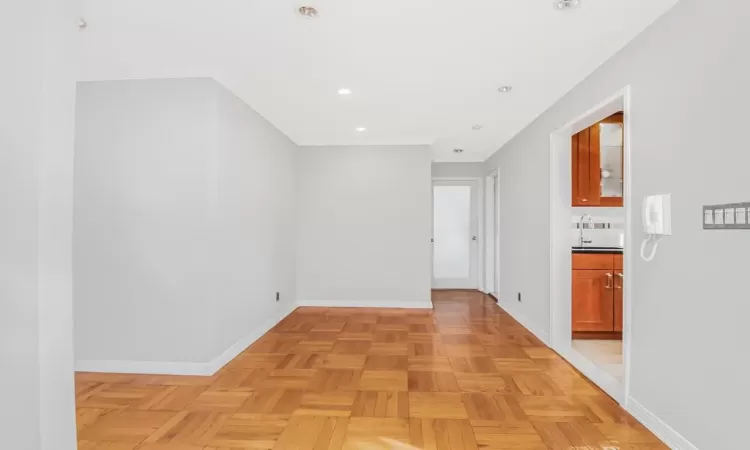 Hall with light parquet floors