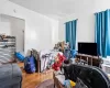 Living room with hardwood / wood-style floors