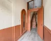 Hallway featuring light wood-type flooring