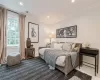 Bedroom with tile patterned flooring and crown molding