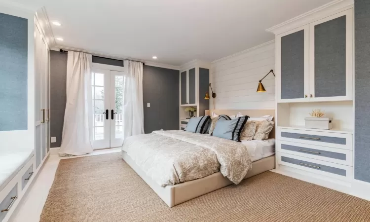 Bedroom featuring access to exterior, crown molding, and french doors