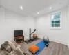 Exercise area featuring hardwood / wood-style floors