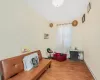 Sitting room with hardwood / wood-style floors