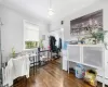 Miscellaneous room with dark hardwood / wood-style flooring, crown molding, and a baseboard heating unit