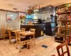 Dining space with light tile patterned floors