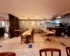 Dining area with light tile patterned floors