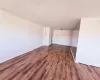 Unfurnished room with hardwood / wood-style floors