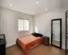 Bedroom featuring hardwood / wood-style flooring