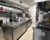 Kitchen featuring light tile patterned floors and stainless steel counters