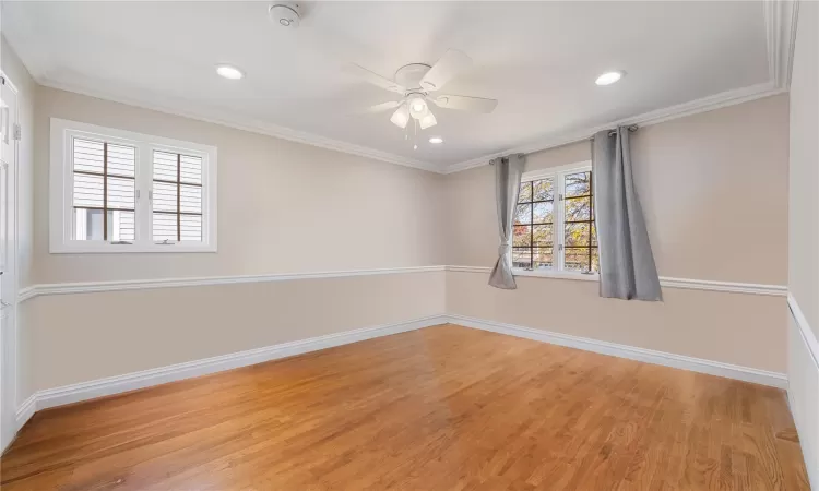 Bedroom with closet 2 windows and ceiling fan