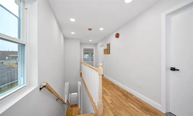 Corridor featuring light hardwood / wood-style flooring