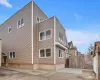 View of side of property with a patio