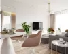 Living room featuring wood-type flooring and a chandelier