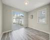 Empty room featuring light wood-type flooring