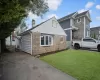 View of front facade with a front yard