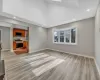 Unfurnished living room with light hardwood / wood-style floors