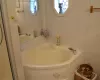 Bathroom with a tub to relax in