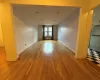 Entryway view of Living Room featuring Hardwood Flooring