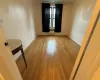 Bedroom featuring Hardwood Flooring