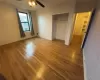 Primary Bedroom featuring Hardwood Flooring