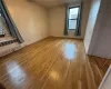 Primary Bedroom featuring Hardwood Flooring